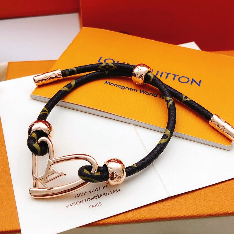 18K Louis Vuitton Heart Charm Bracelet