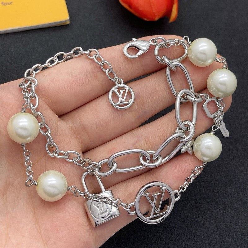 18K Louis Vuitton Pearl Lock Gold Bracelet
