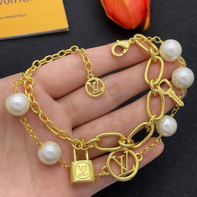 18K Louis Vuitton Pearl Lock Gold Bracelet
