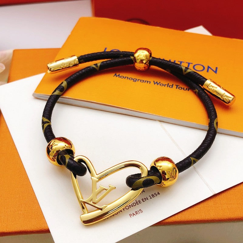 18K Louis Vuitton Heart Charm Bracelet