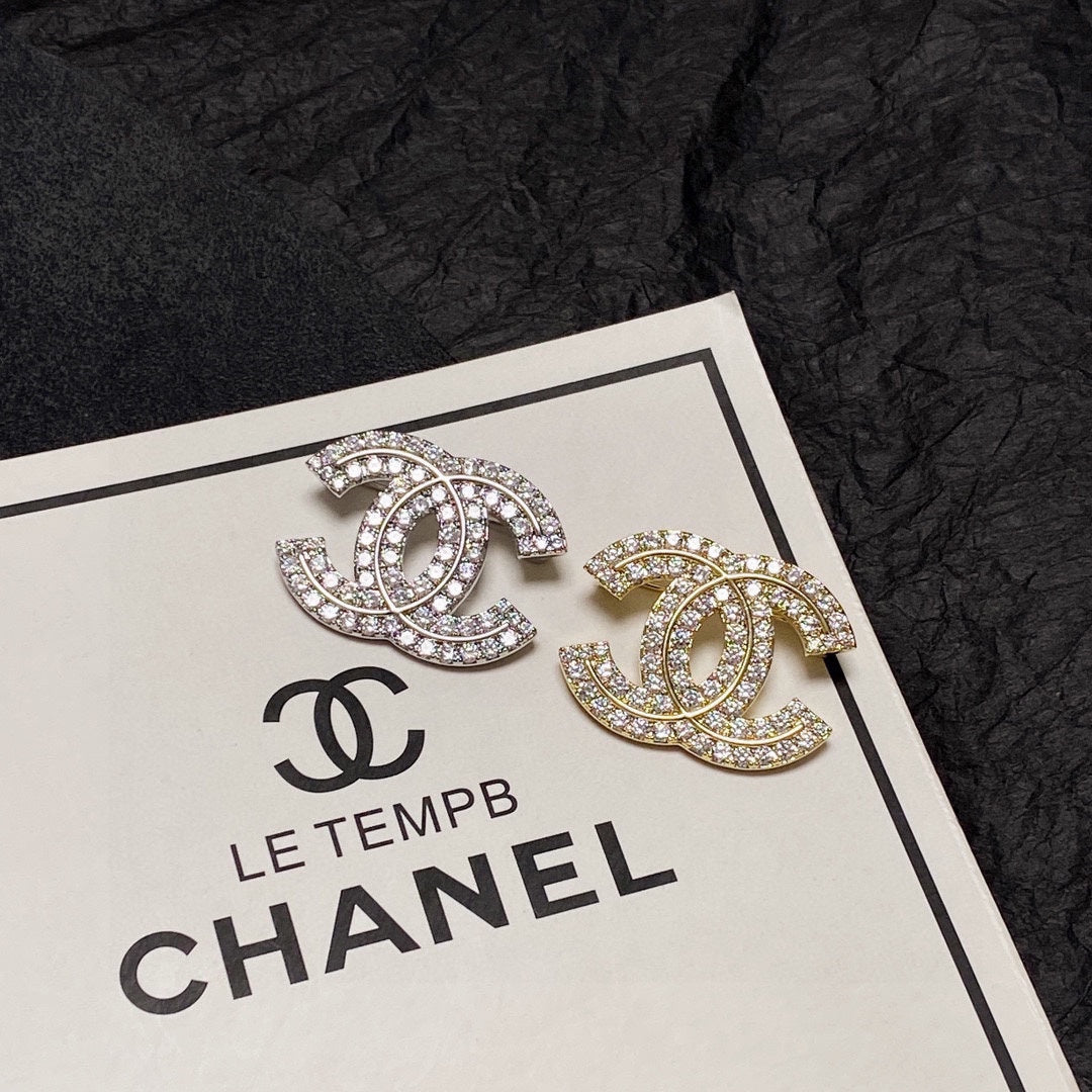 18K  Chanel Diamonds Set Broochs