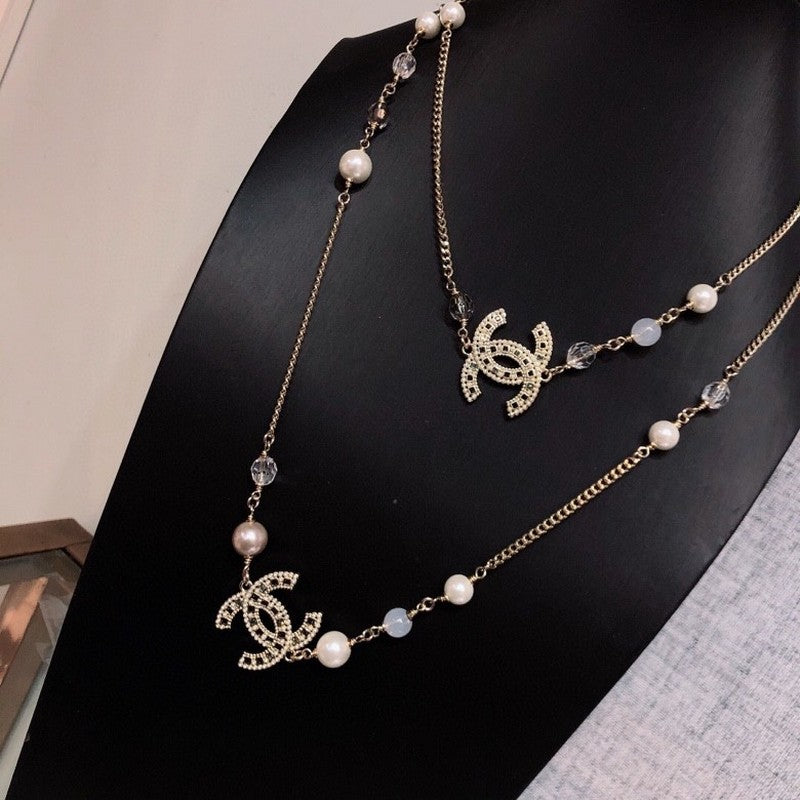18K  Chanel Long Pearl Necklace