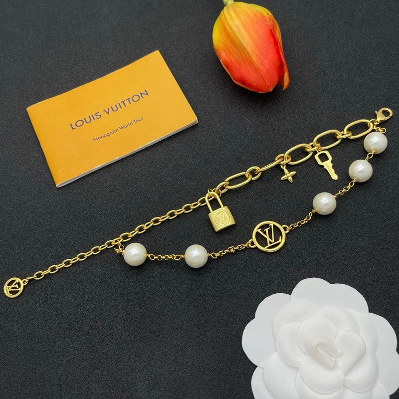 18K Louis Vuitton Pearl Lock Gold Bracelet