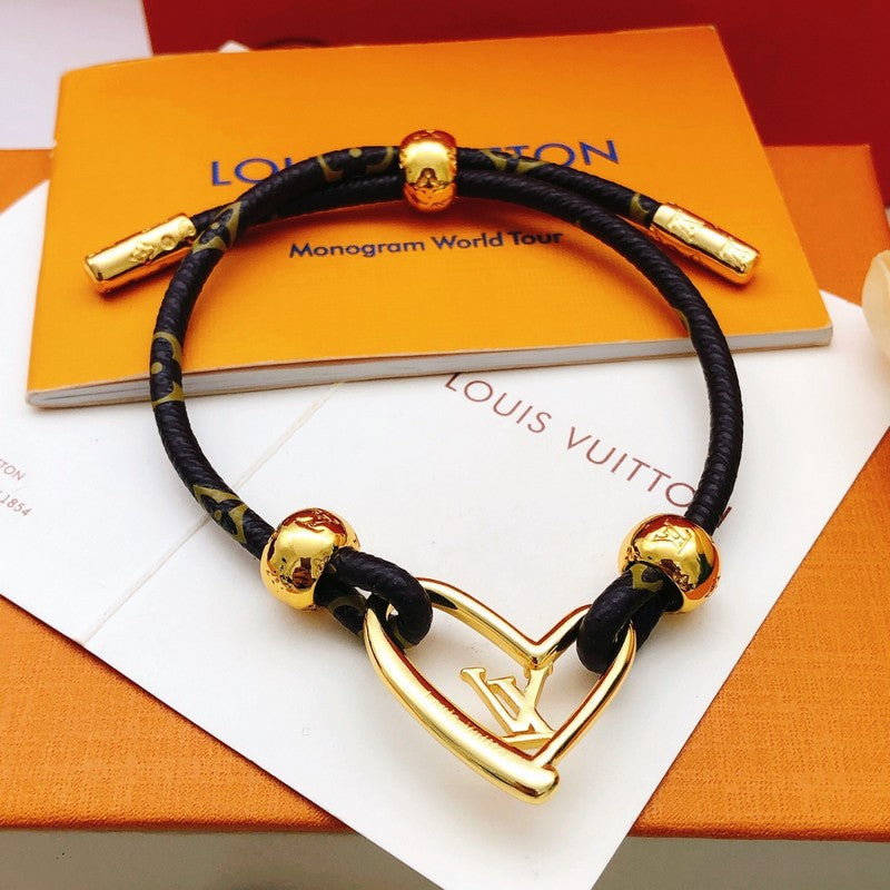 18K Louis Vuitton Heart Charm Bracelet