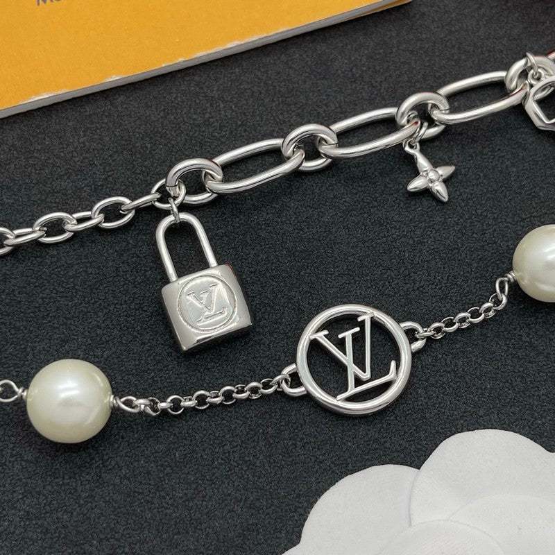 18K Louis Vuitton Pearl Lock Gold Bracelet