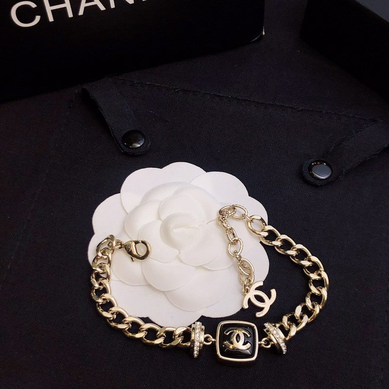 18K  Chanel Black Logo Gold Chain Bracelet