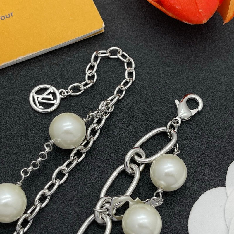 18K Louis Vuitton Pearl Lock Gold Bracelet