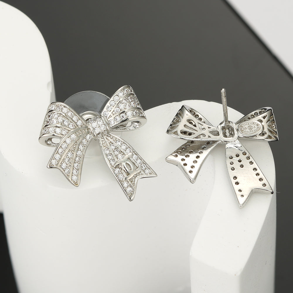 18K  Chanel Bow Tie Diamond Earrings