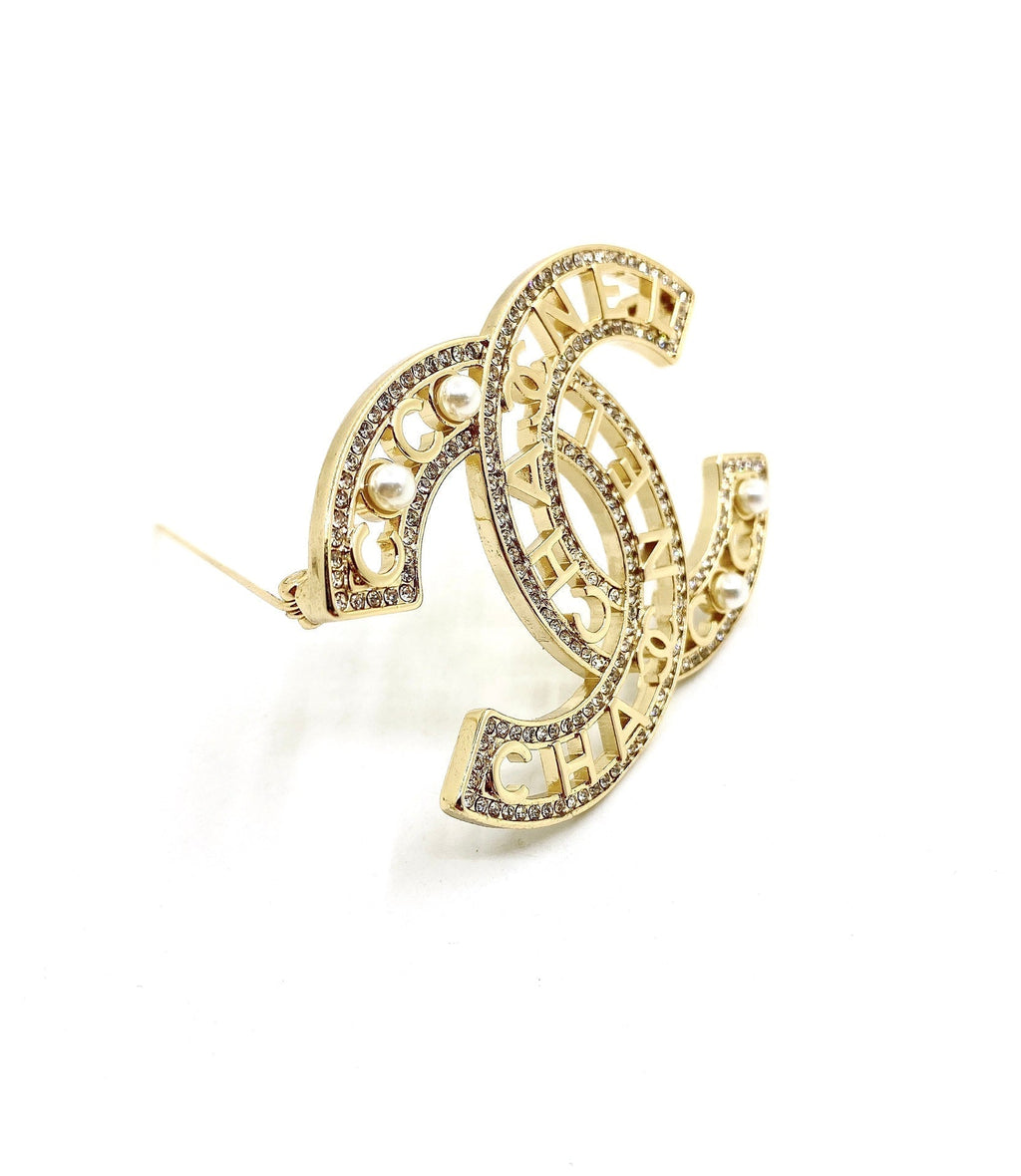 18K  Chanel Script Diamonds Brooch