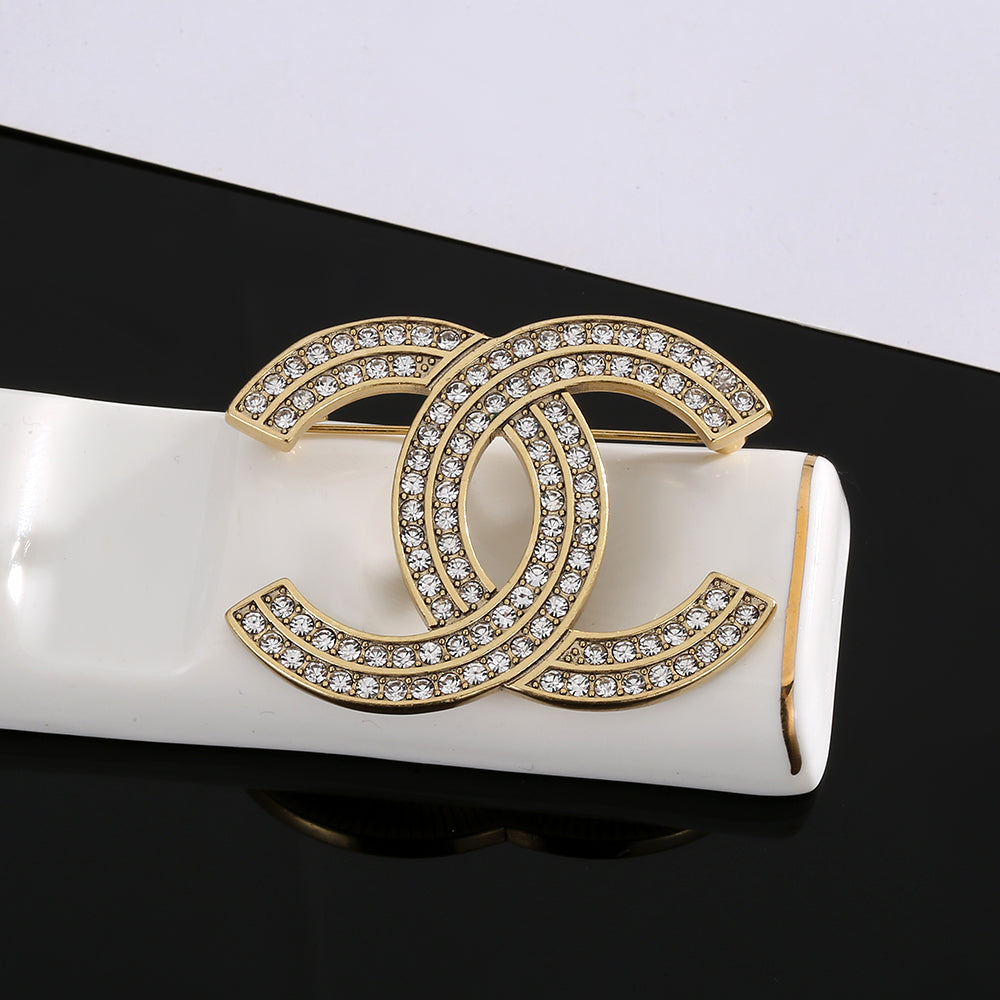 18K  Chanel Diamond Brooch