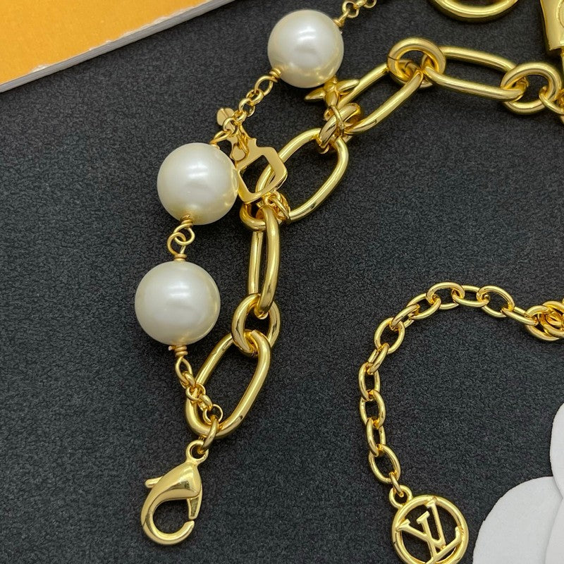 18K Louis Vuitton Pearl Lock Gold Bracelet