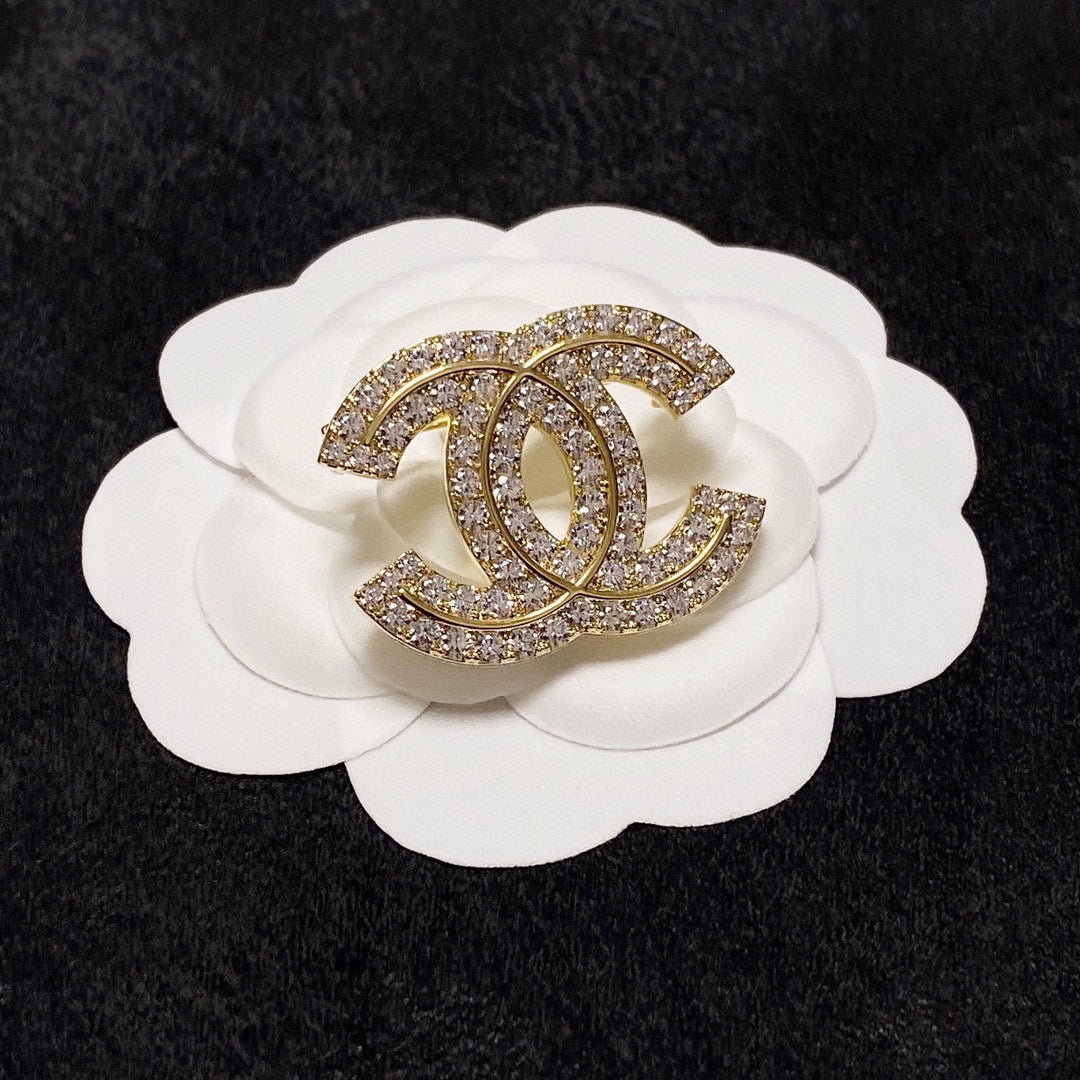18K  Chanel Diamonds Set Broochs