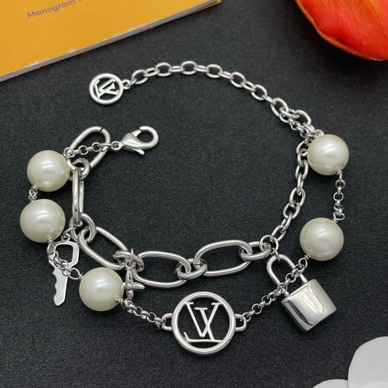 18K Louis Vuitton Pearl Lock Gold Bracelet