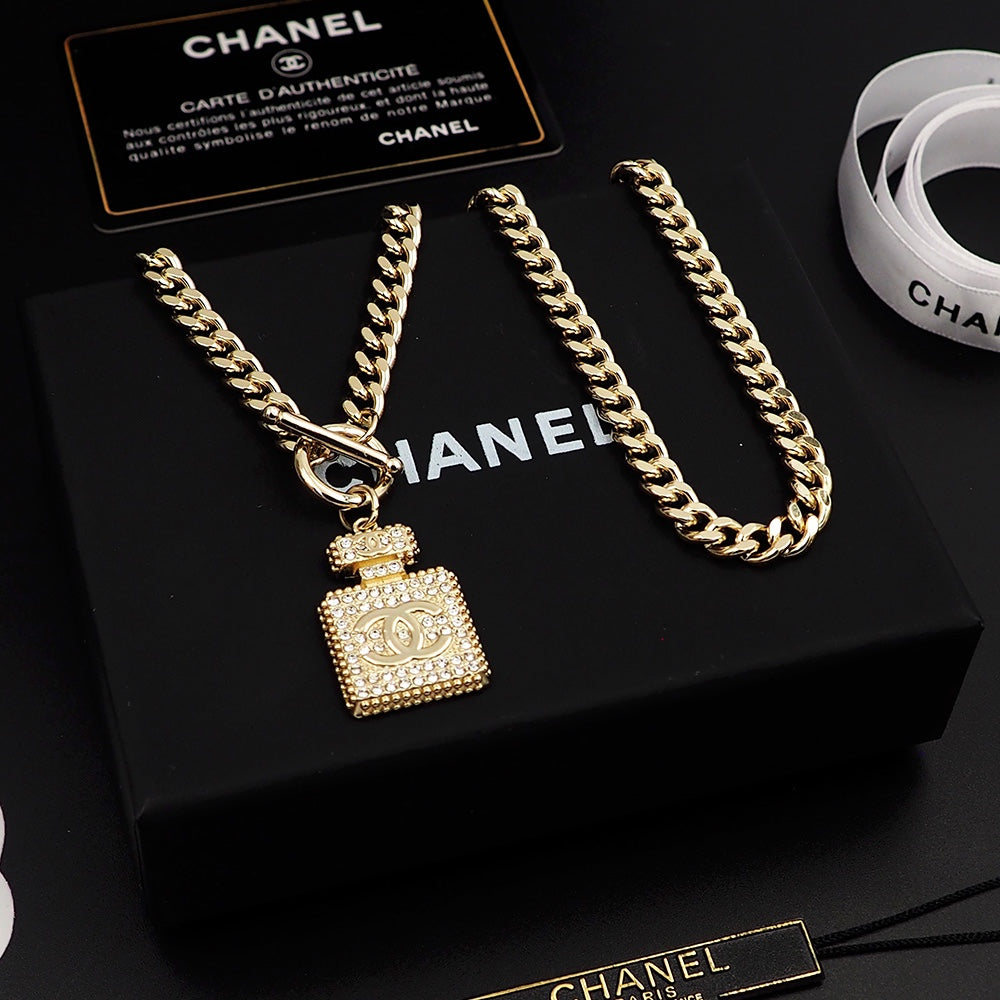 18K  Chanel Diamond Perfume Bottle Pendant Necklace