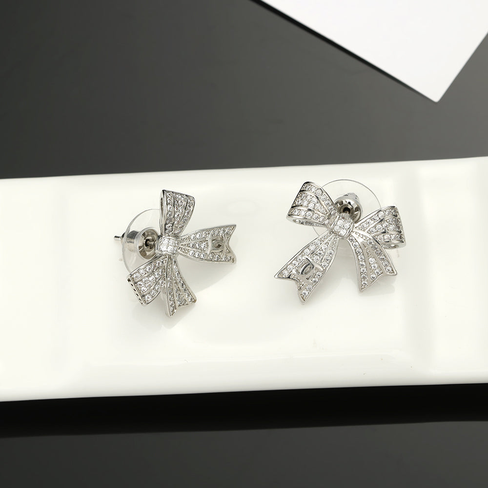 18K  Chanel Bow Tie Diamond Earrings