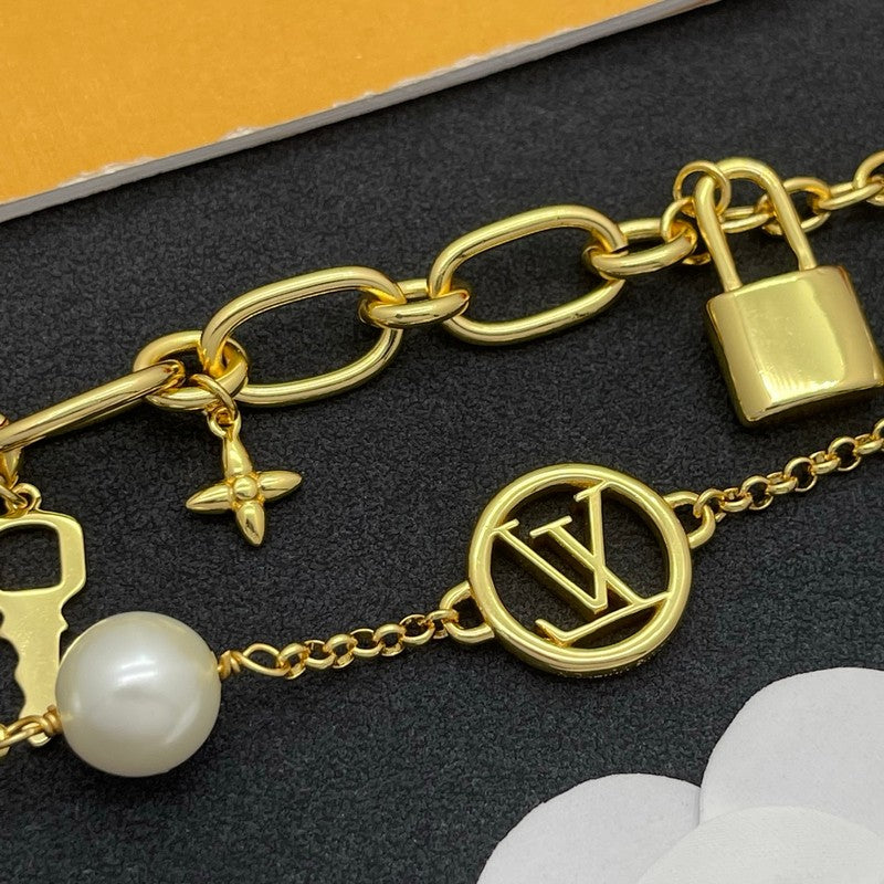 18K Louis Vuitton Pearl Lock Gold Bracelet