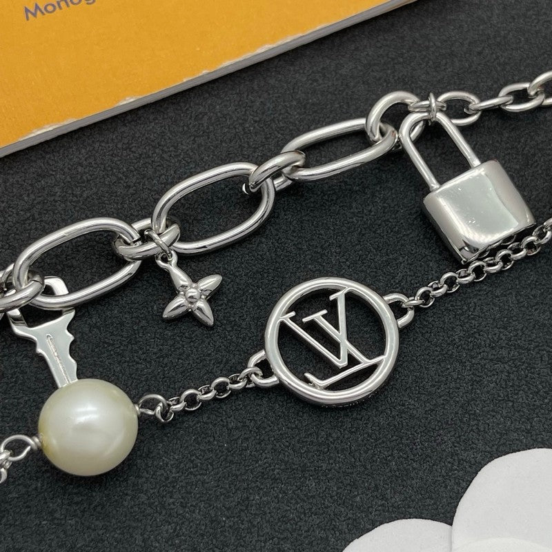 18K Louis Vuitton Pearl Lock Gold Bracelet