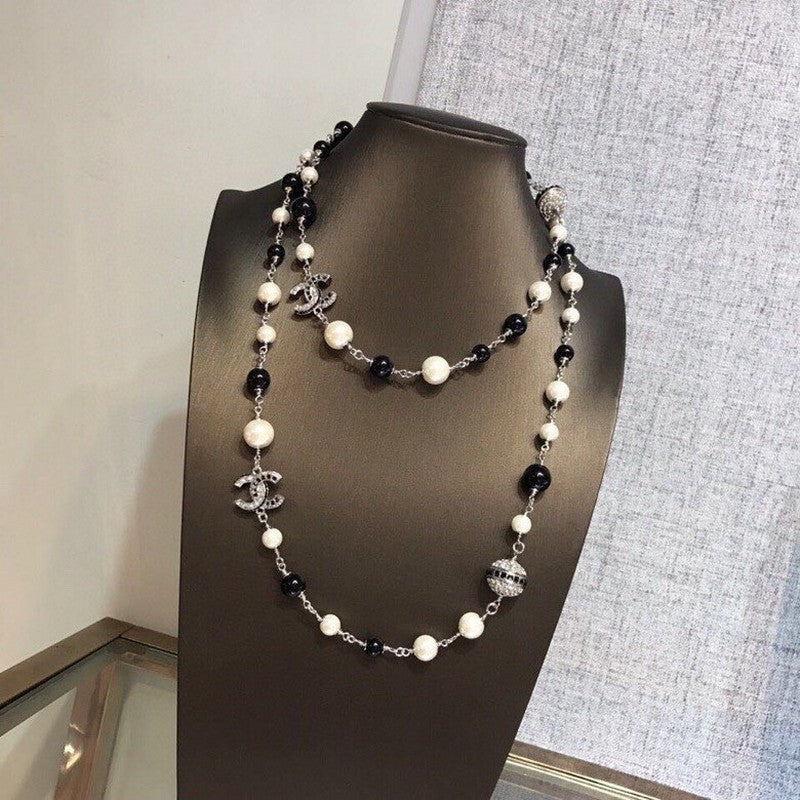 18K  Chanel Long Black Pearl Necklace