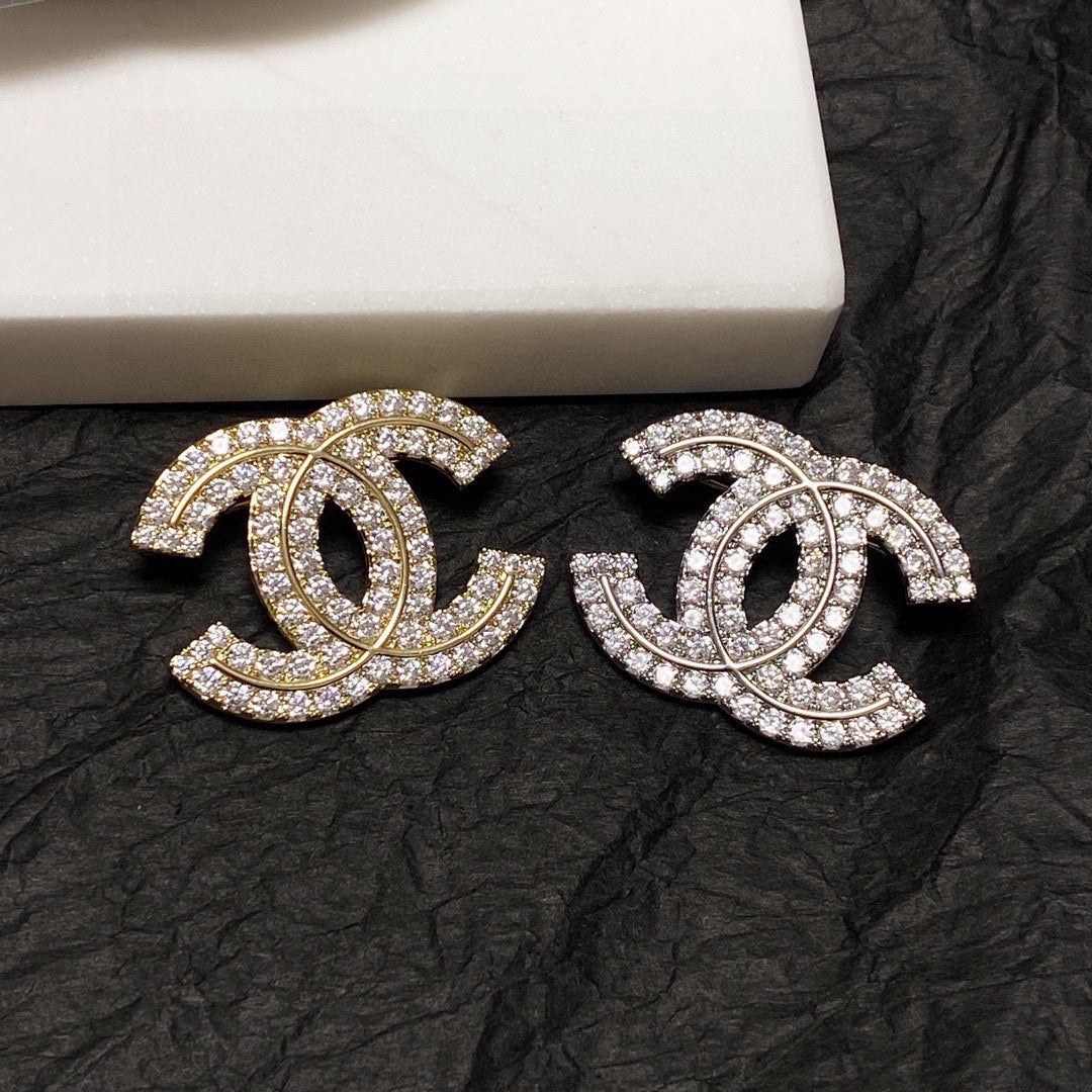 18K  Chanel Diamonds Set Broochs